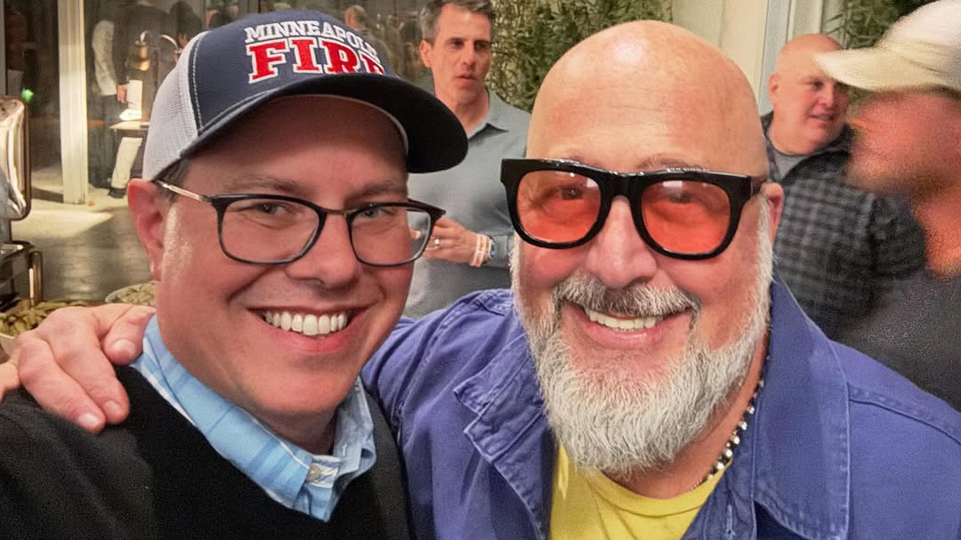 Josh Thoma with Andrew Zimmern at an event
